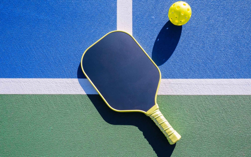 Close Up View Of A Pickle Ball Paddle On Court
